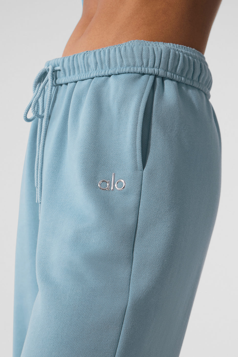 Front view of camo sweatpants in Celestial Blue, styled for casual outings.