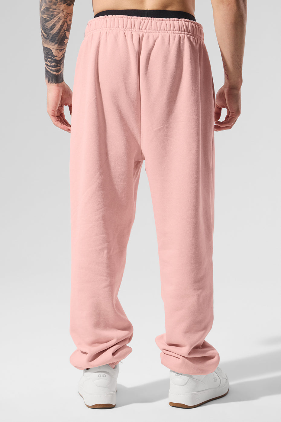 Close up of the elastic waistband on pink quartz camo sweatpants.