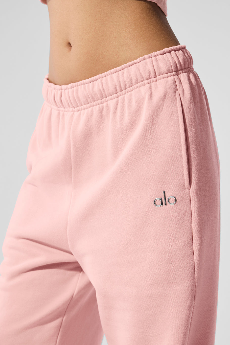 Back view showcasing elastic waistband on black sweatpants