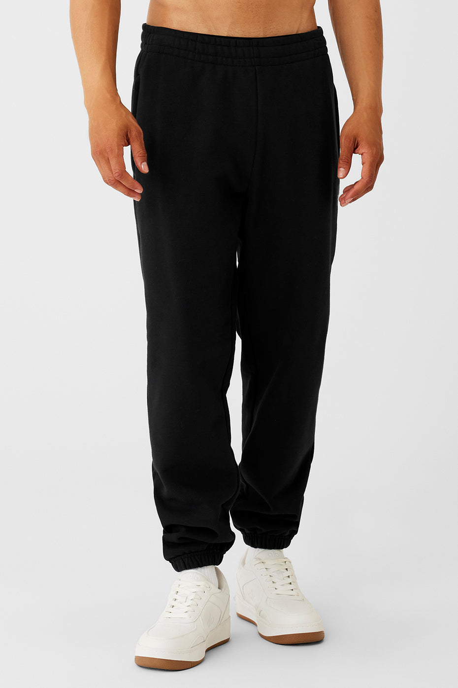 Front view of Urban Comfort Cuffed Sweatpants in black, showcasing the cuffed design.