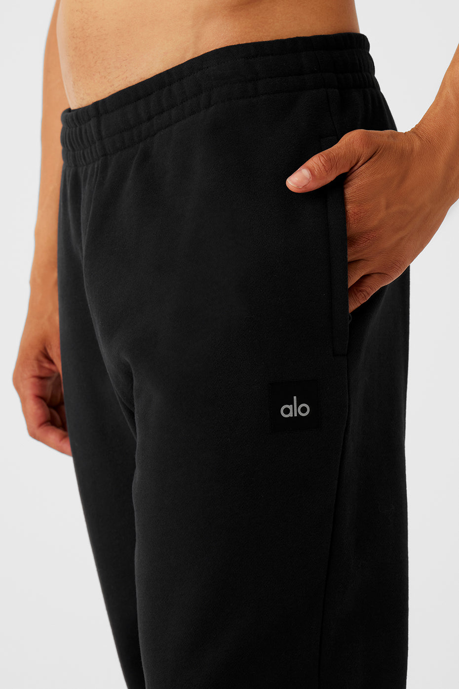 Front view of Urban Comfort Cuffed Sweatpants in black, showcasing the cuffed design.
