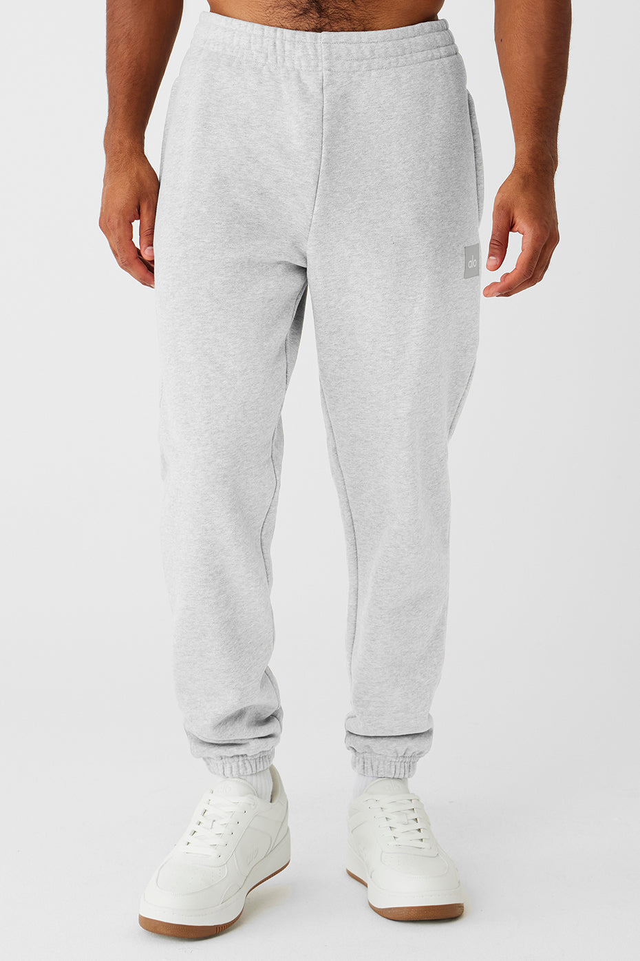 Renown heavyweight cuffed sweatpants in athletic grey from the side, showcasing the fit.