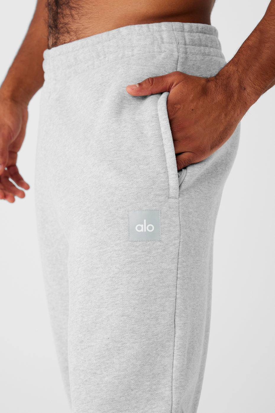 Renown heavyweight cuffed sweatpants in athletic grey from the side, showcasing the fit.