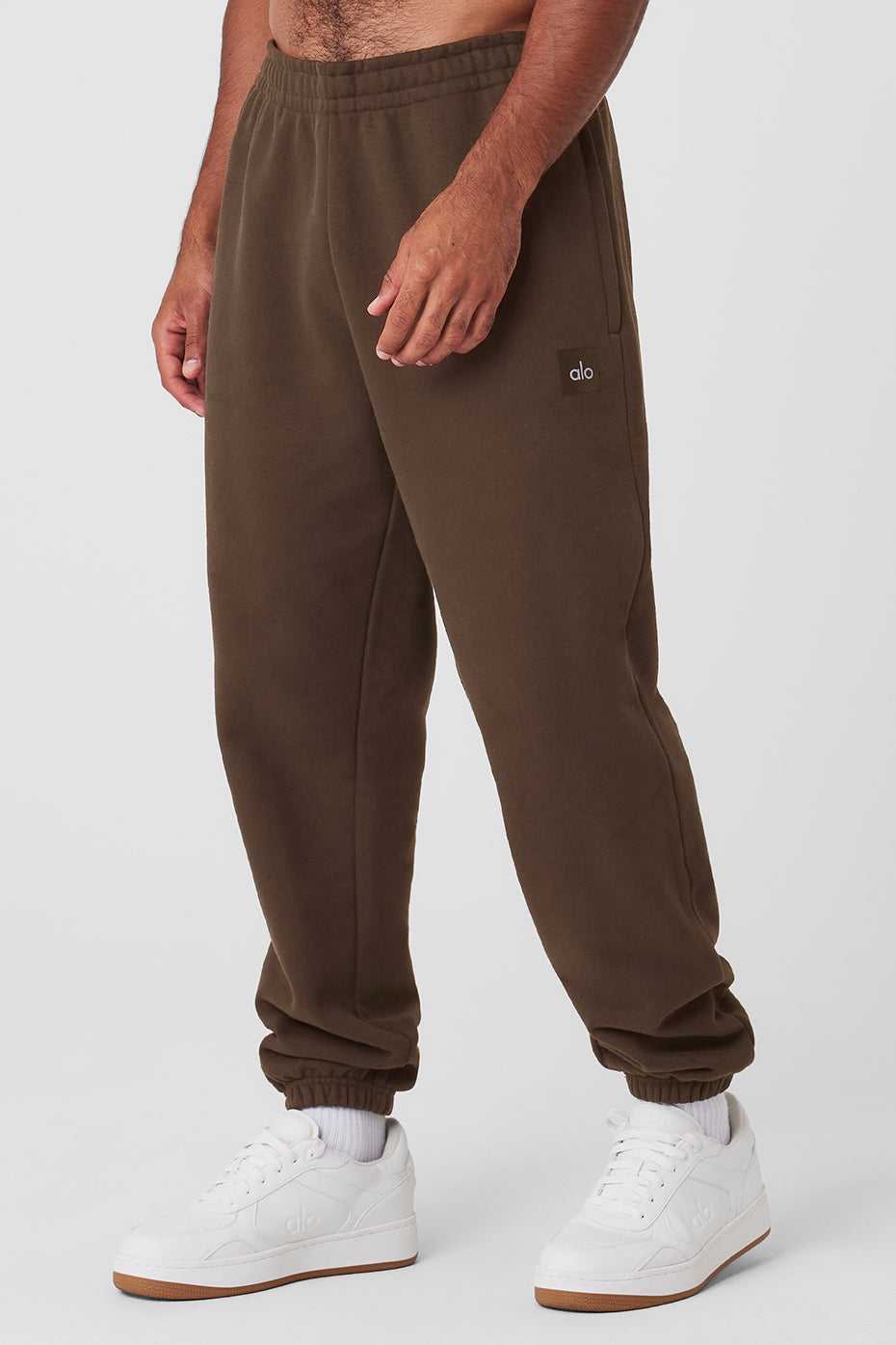Close-up of cuffed hems on heavyweight joggers with texture detail