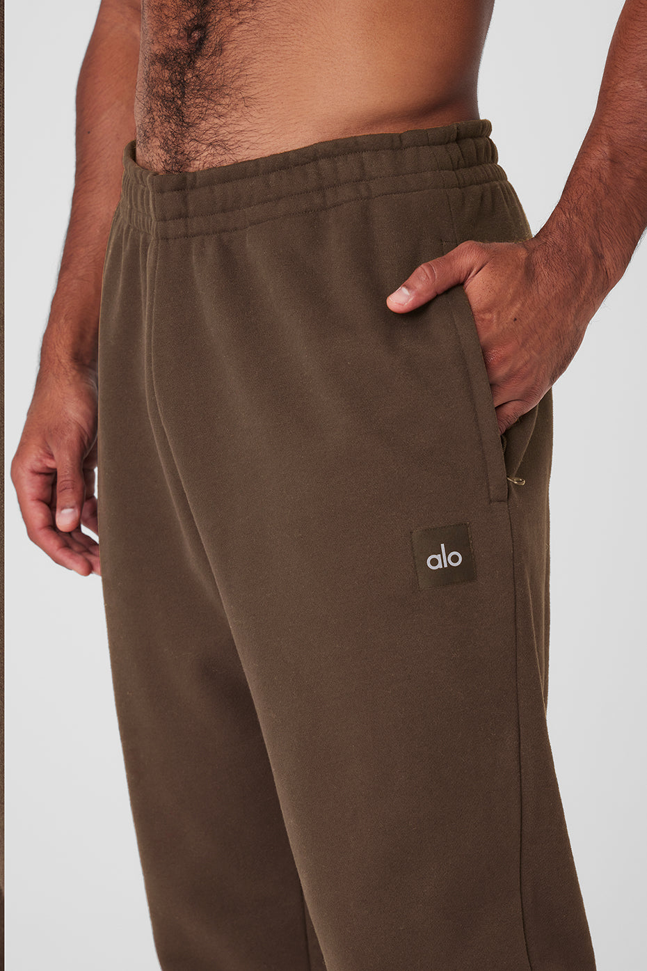 Model wearing camo sweatpants outdoors near Idaho foothills