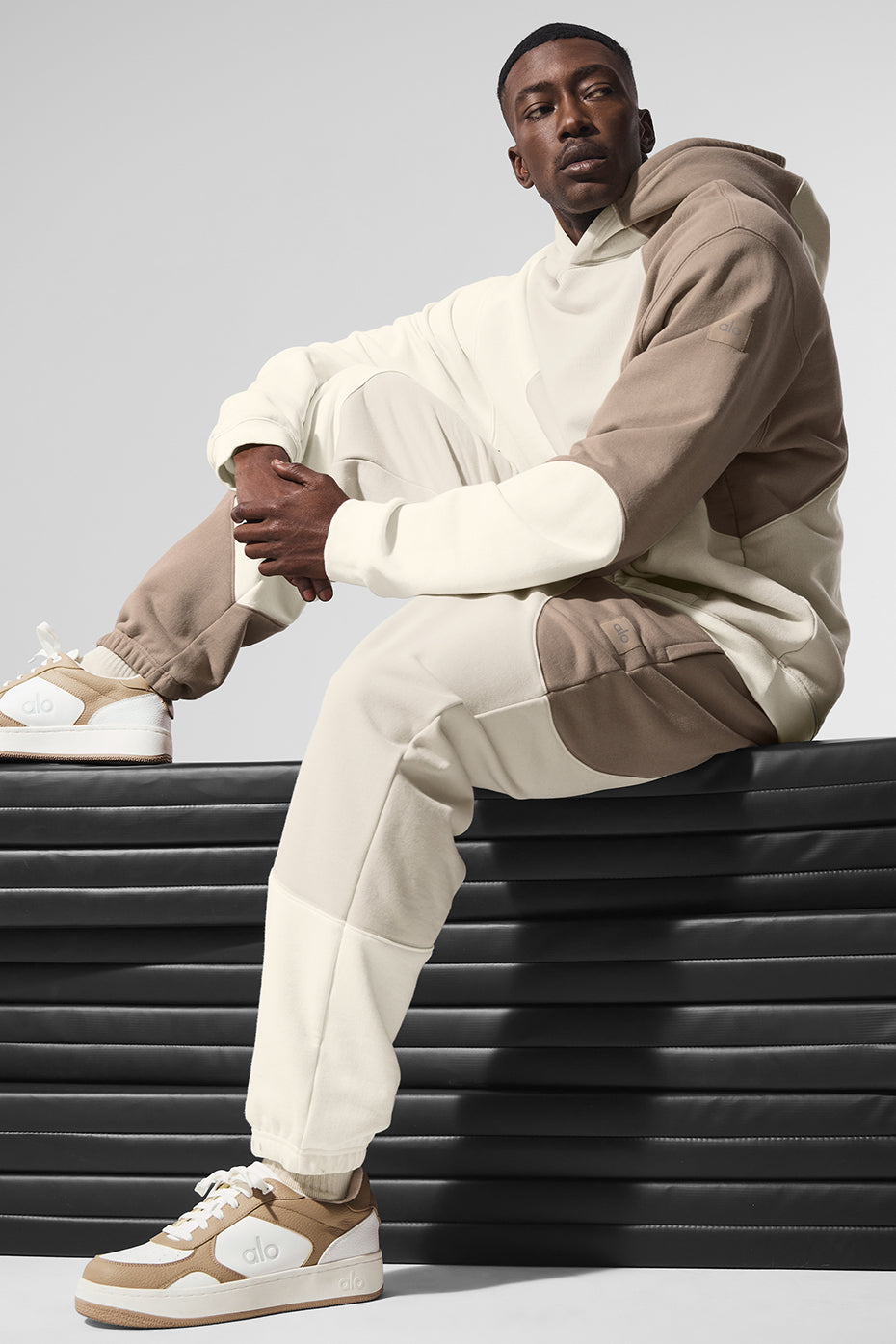 Model posing in relaxed-fit wide-leg sweatpants