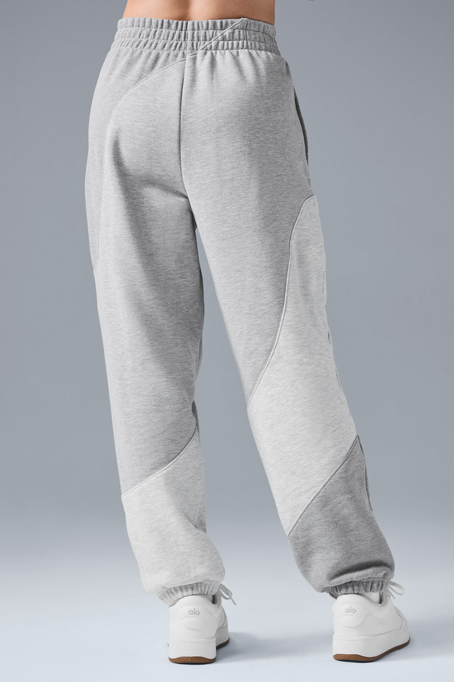 Lay flat shot showing camo sweatpants fabric texture.