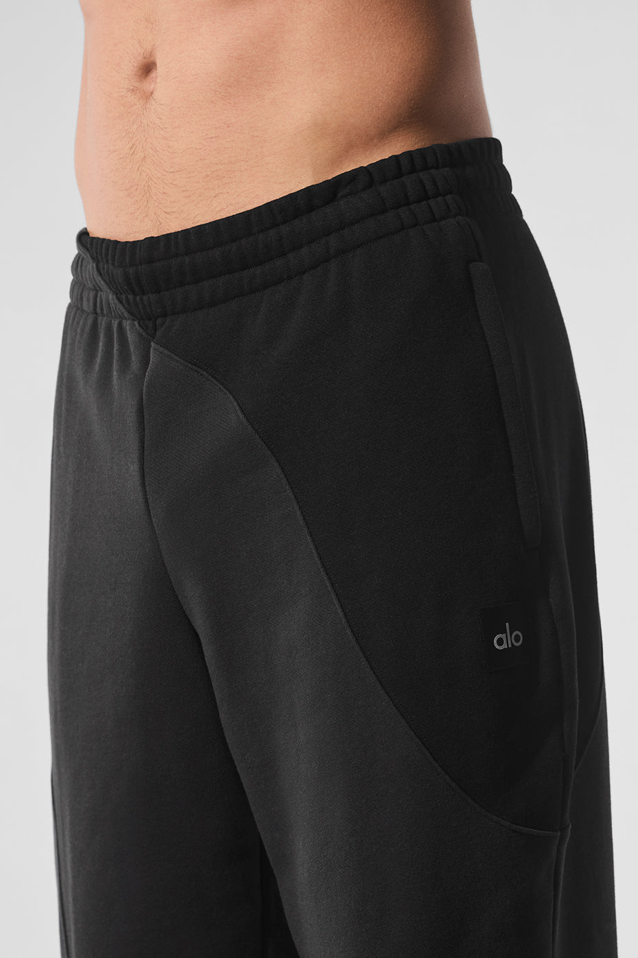 Front view of Swagger Wave Vintage Black Sweatpants showcasing the unique wave pattern.