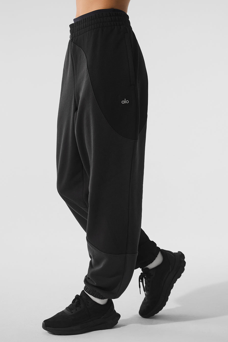 Flat lay of the sweatpants paired with a matching hoodie for loungewear look