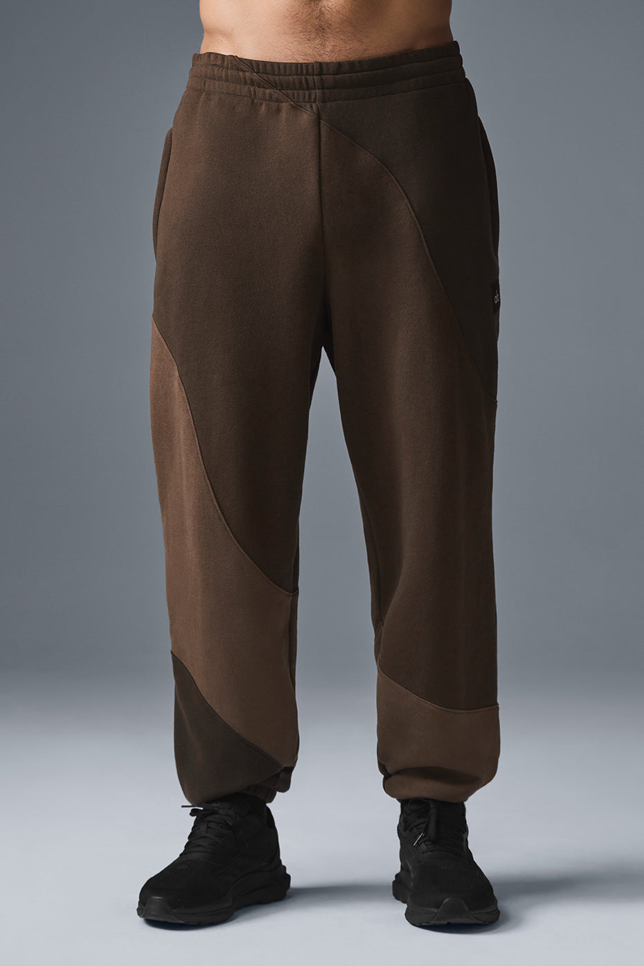 Men's wide leg sweatpants in espresso with stitched wave pattern, perfect for lounging or activewear