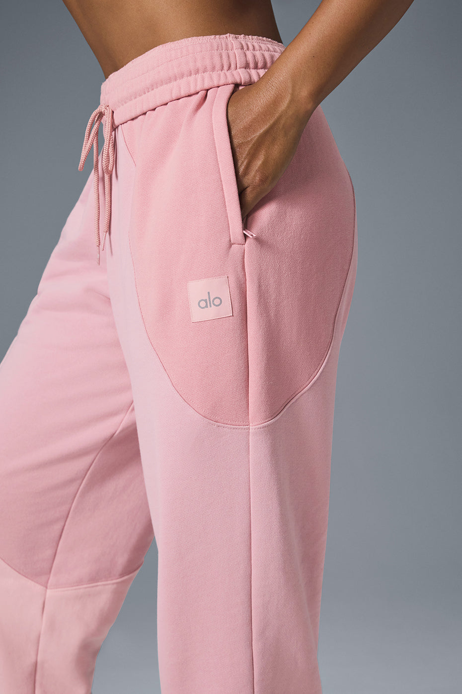 Sunset Pink Tonal wide leg sweatpants with wave design displayed on model