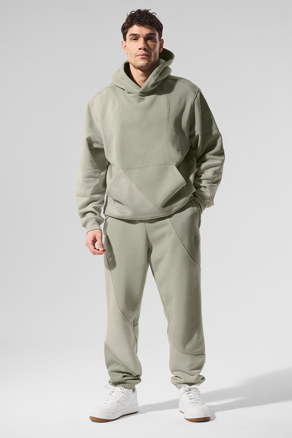 Front view of relaxed fit French terry sweatpants in limestone tone with elastic waistband
