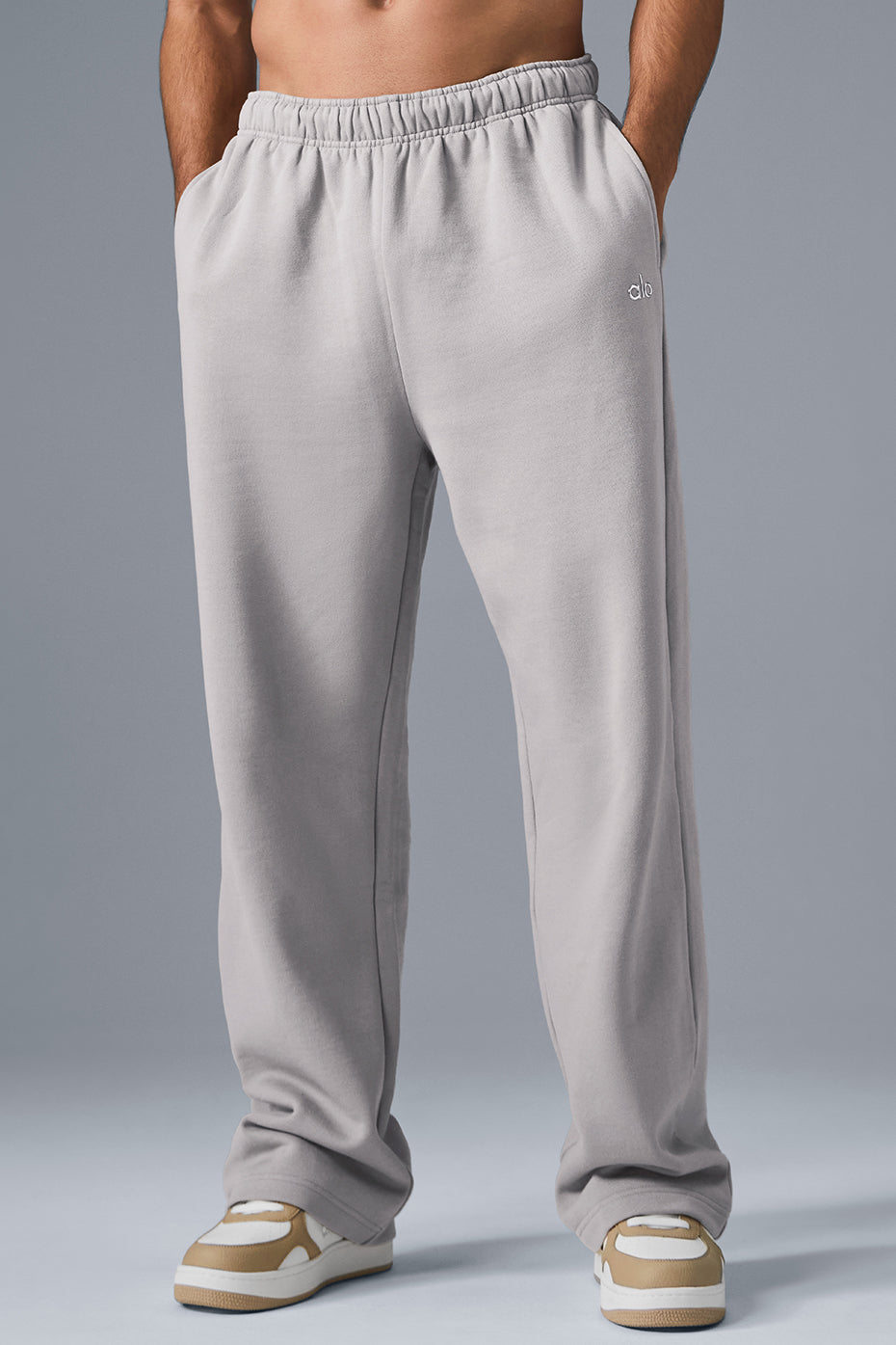 Front view of grey wide leg sweatpants highlighting the relaxed fit and washed finish