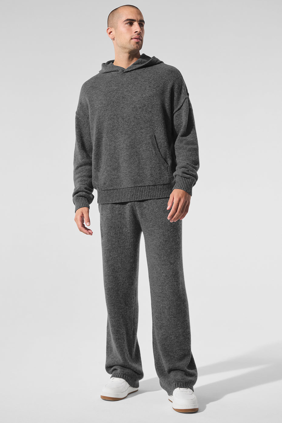 Casual outfit featuring cashmere lounge pants paired with a hoodie.