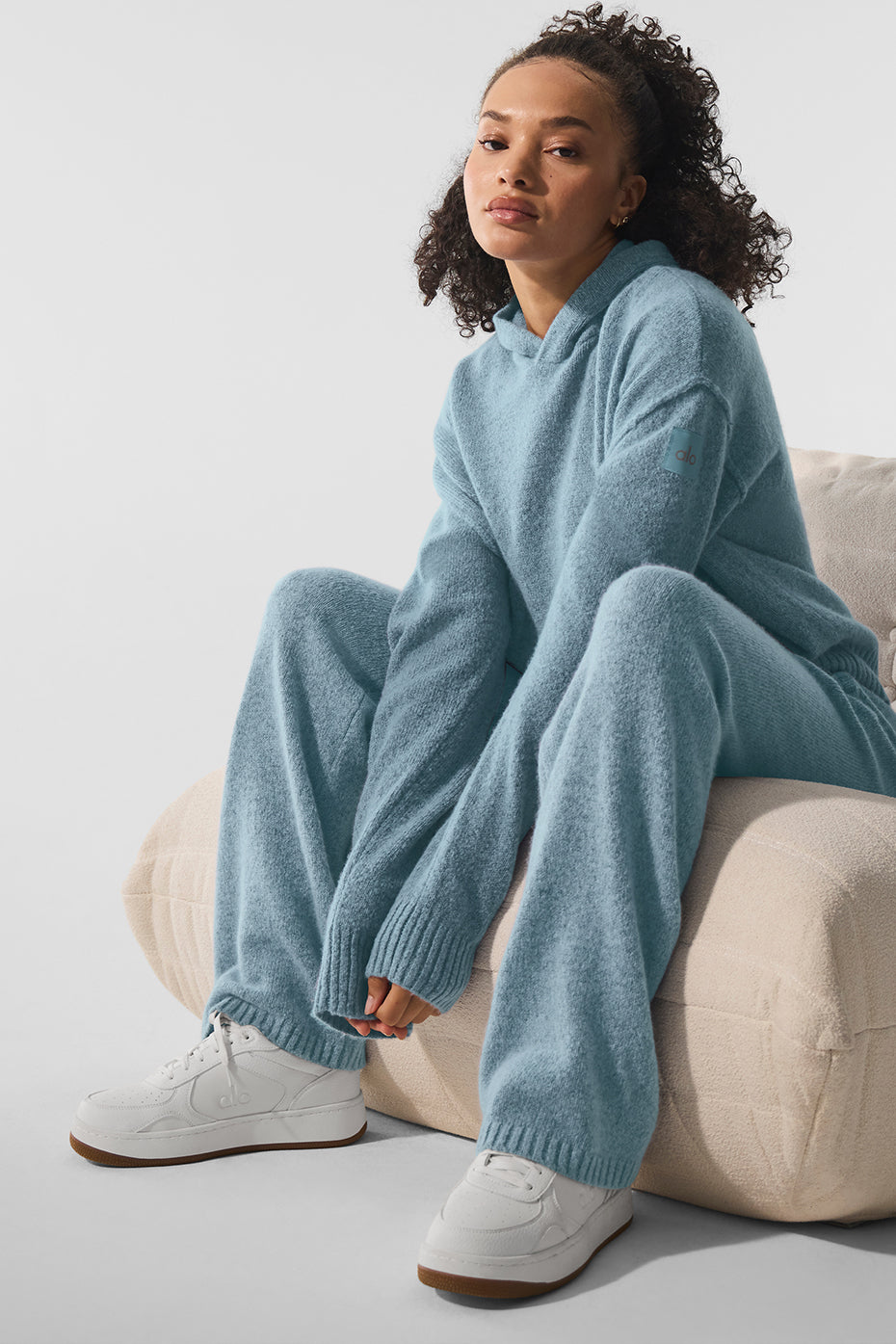 Close-up of soft cashmere fabric in luxurious lounge pants.