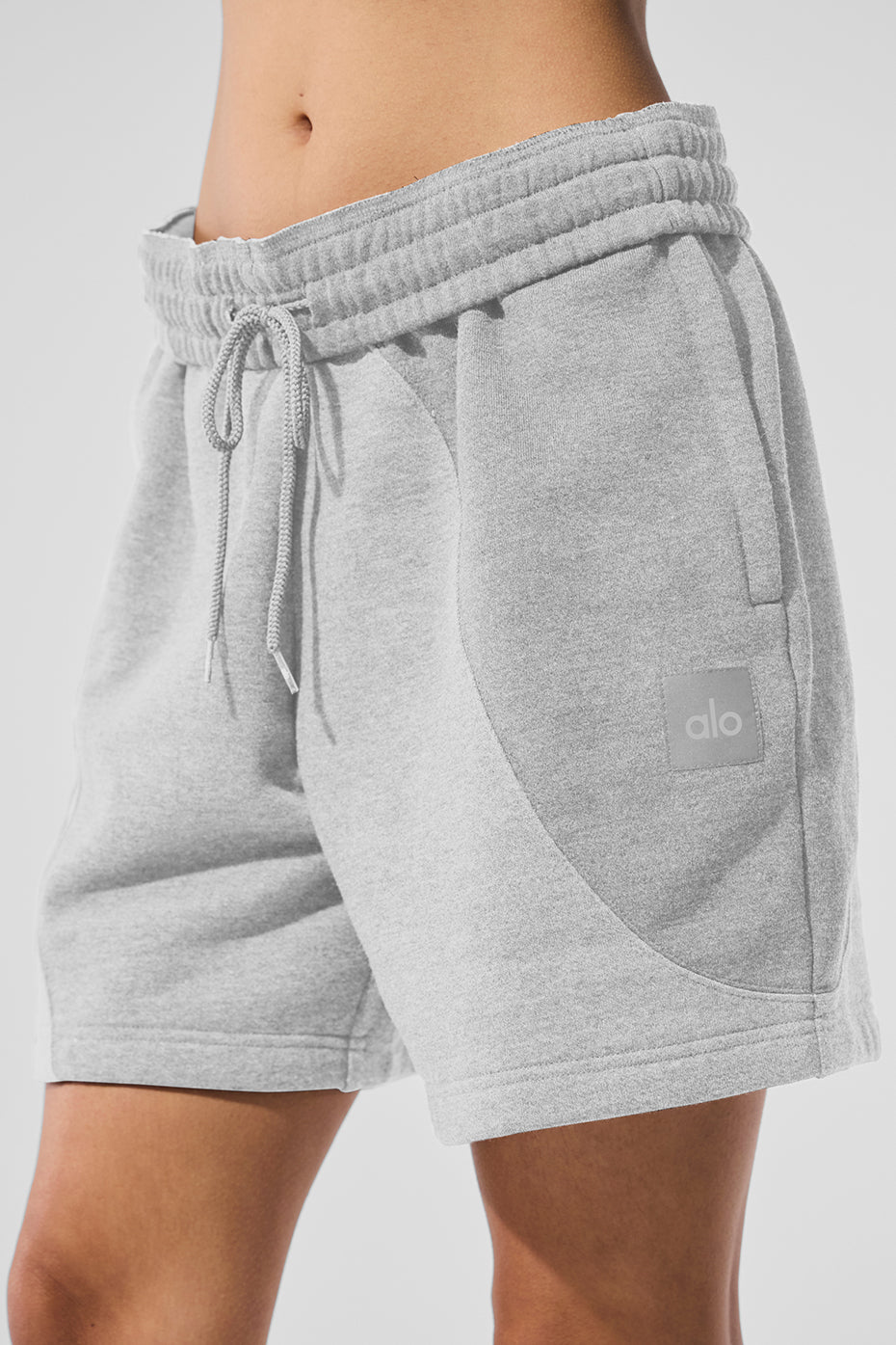 Front view of WaveFlex 7-Inch shorts showing tonal stitching and Heather Grey finish