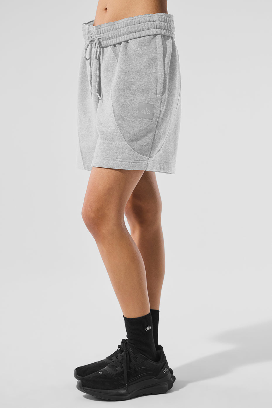 Back detail of shorts highlighting smooth fleece texture and tailored seam
