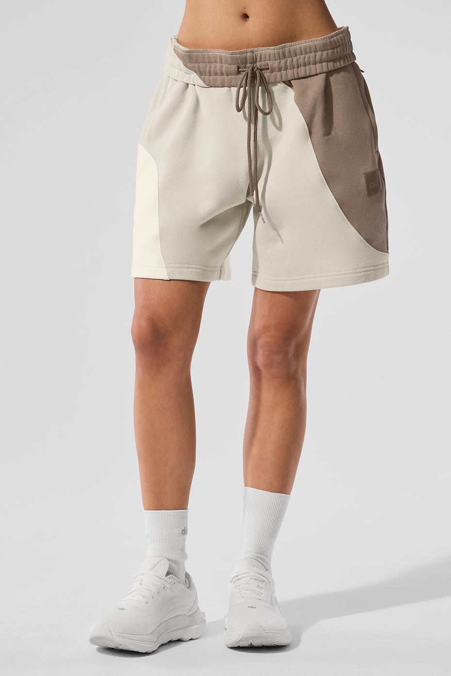 Front angle of s&s activewear fleece shorts worn casually at a park