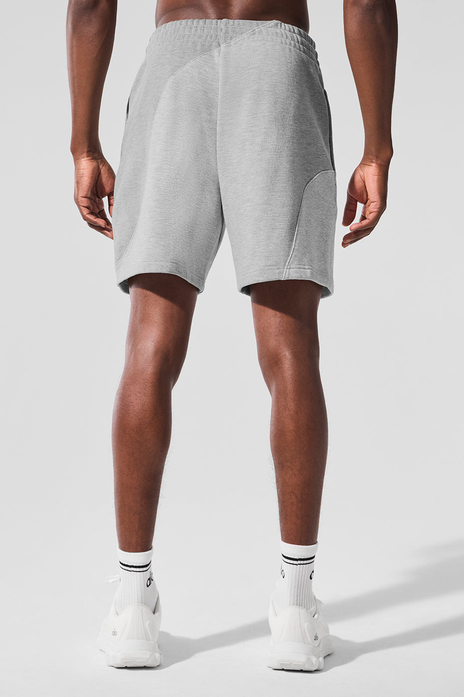 Side view showcasing the unique seamed wave pattern of the shorts.