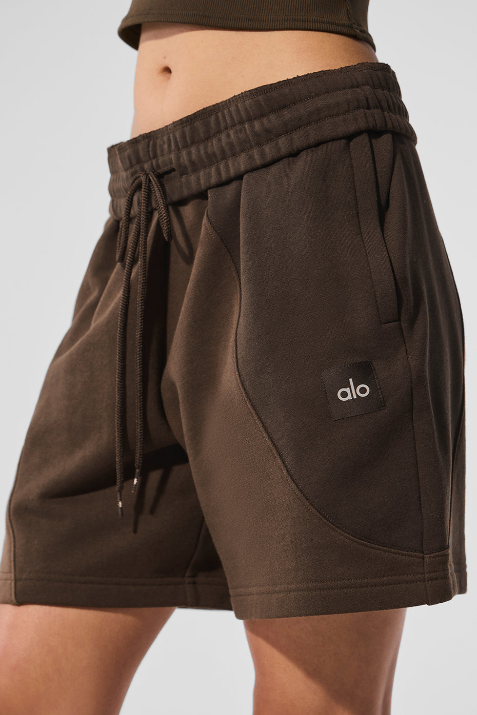 Close-up of wave pattern detailing on mens running shorts