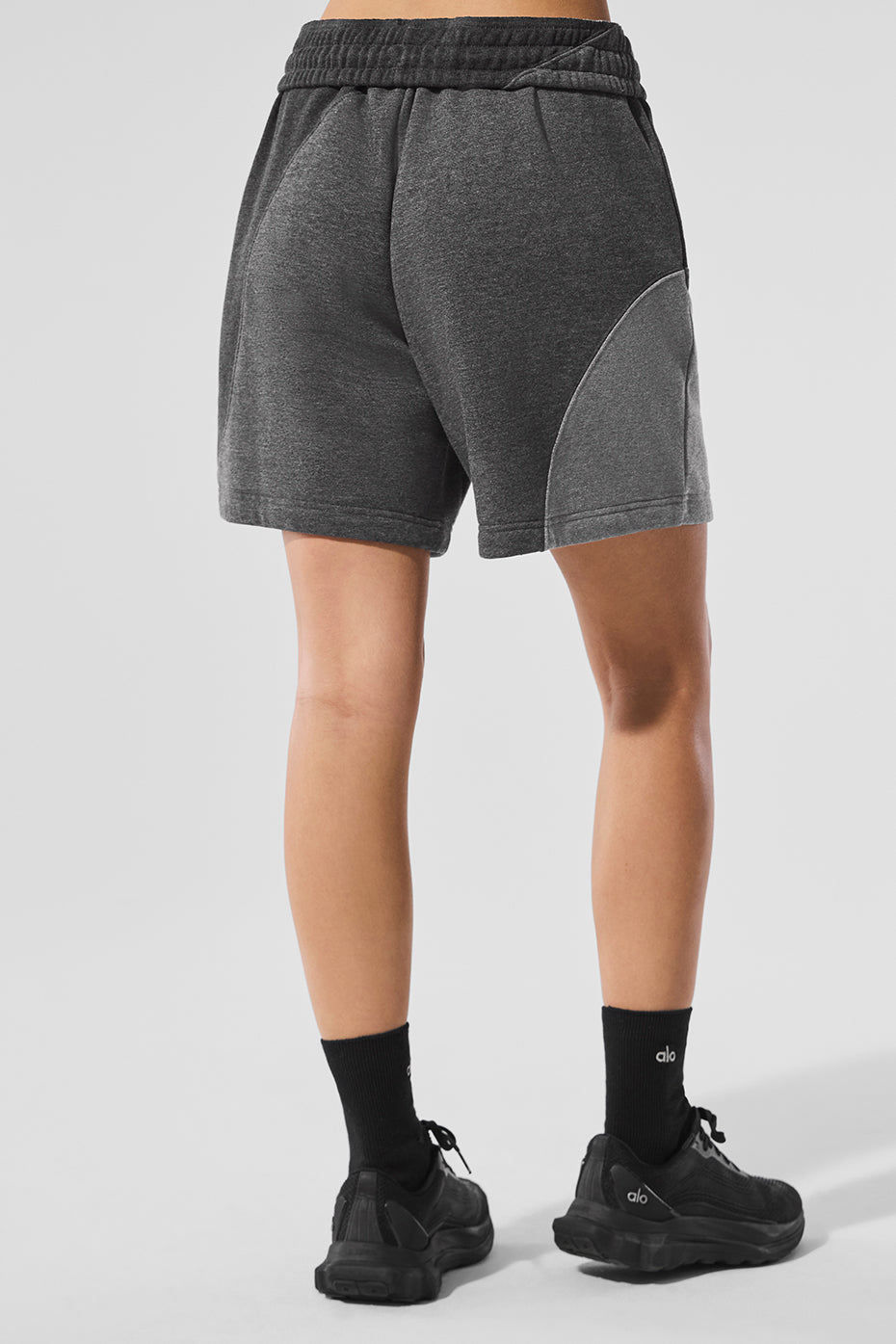 Seamed wave pattern on the dark heather grey mens shorts.