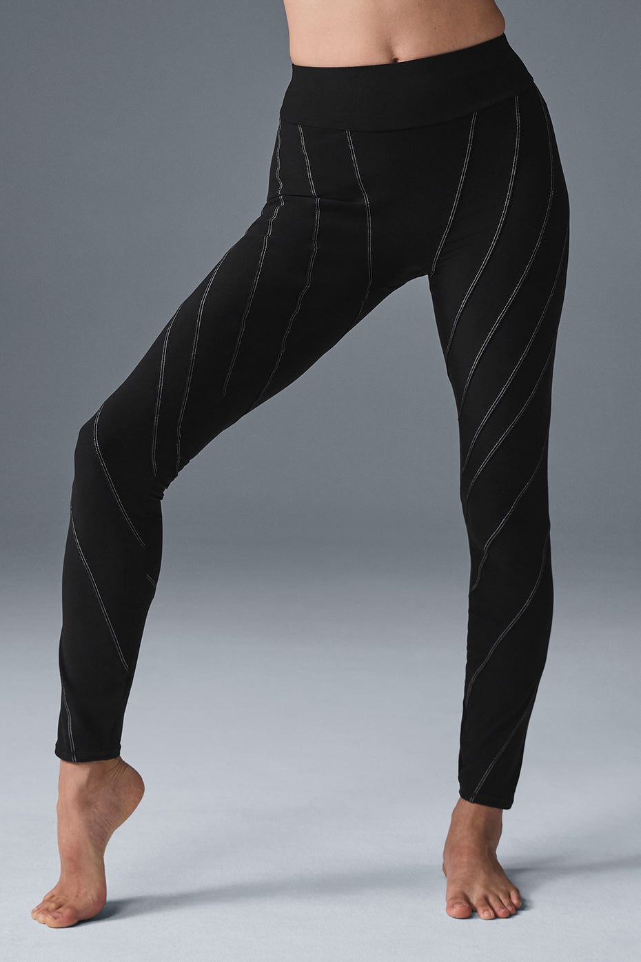 Front view of high-waist leggings with sleek compression fit, perfect for gym or street wear