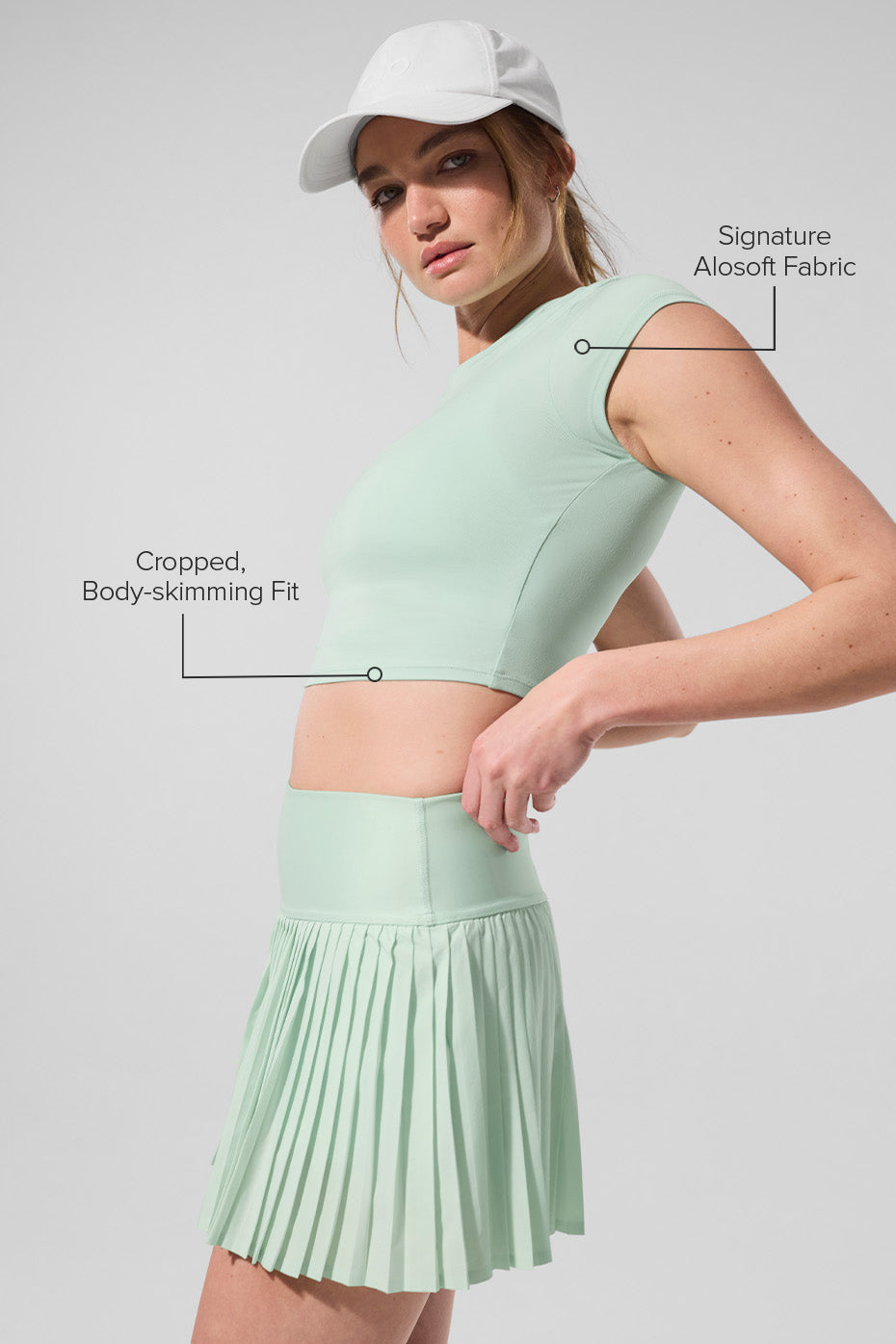 Model wearing the crop top during yoga in a bright studio setting