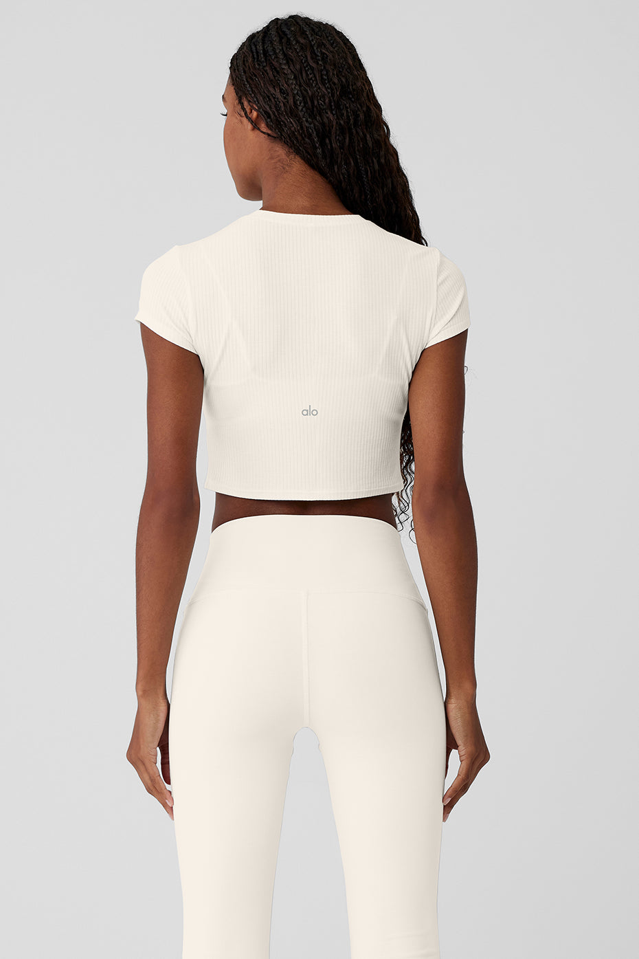 Side angle of the cropped tee, highlighting the cap sleeves.
