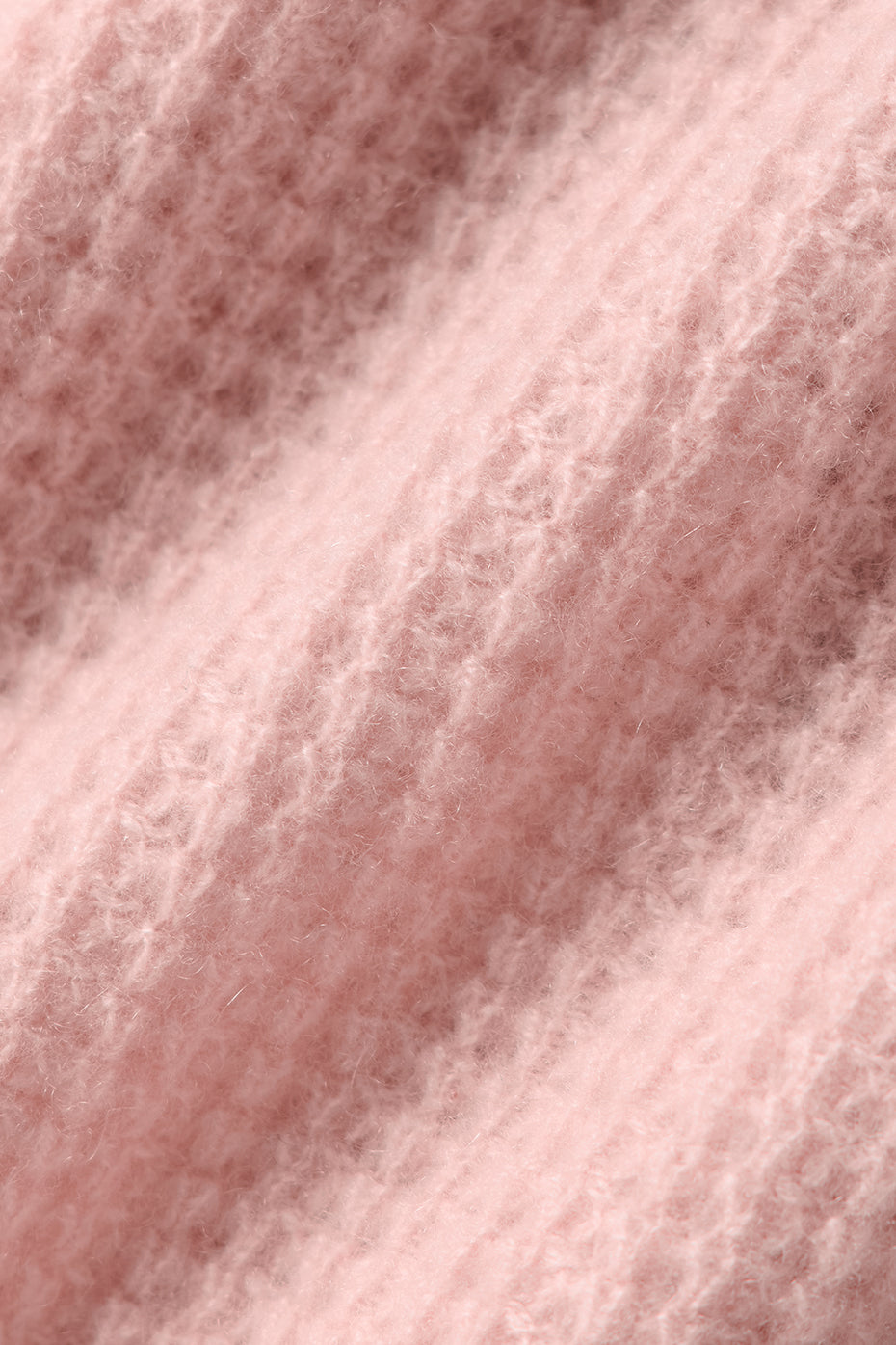 Front view of luxury cashmere waffle polo shirt in pink quartz.