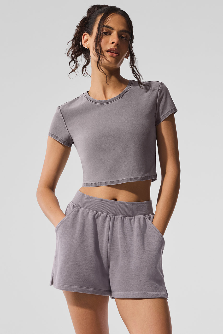 Casual styling of the crop top paired with leggings for everyday wear
