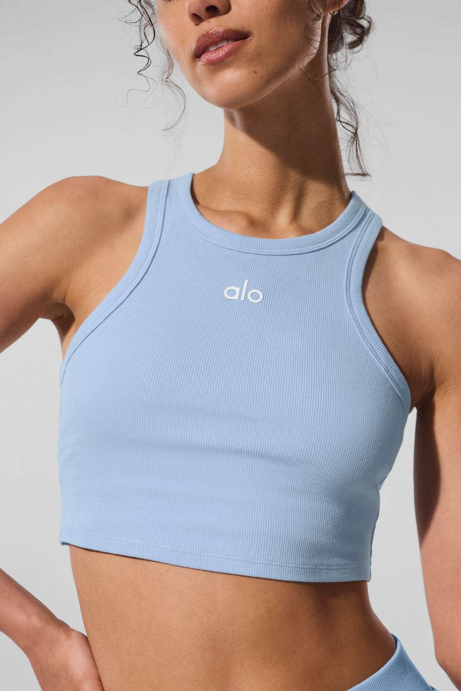 Front view of Aspire cropped tank top in seashell blue.