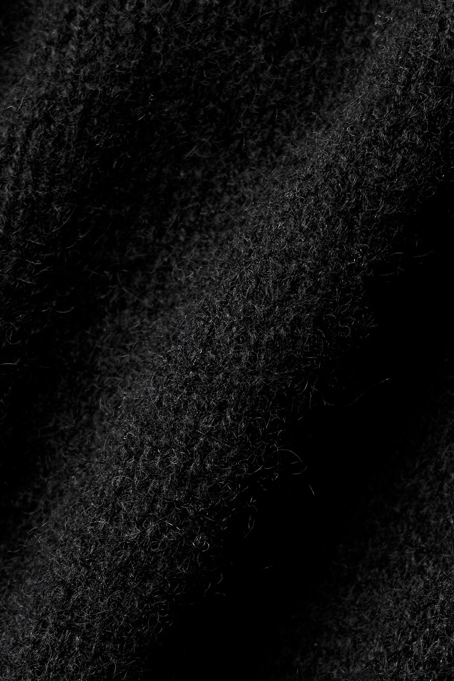 Close-up of the sheer long sleeve tops fabric texture and design.