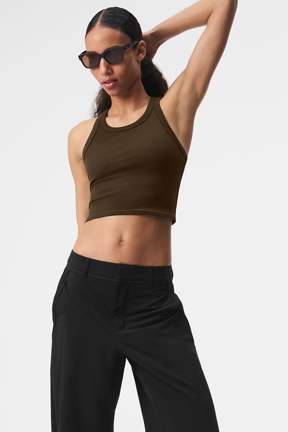 Front view of womens ribbed crop tank top in espresso color on a model