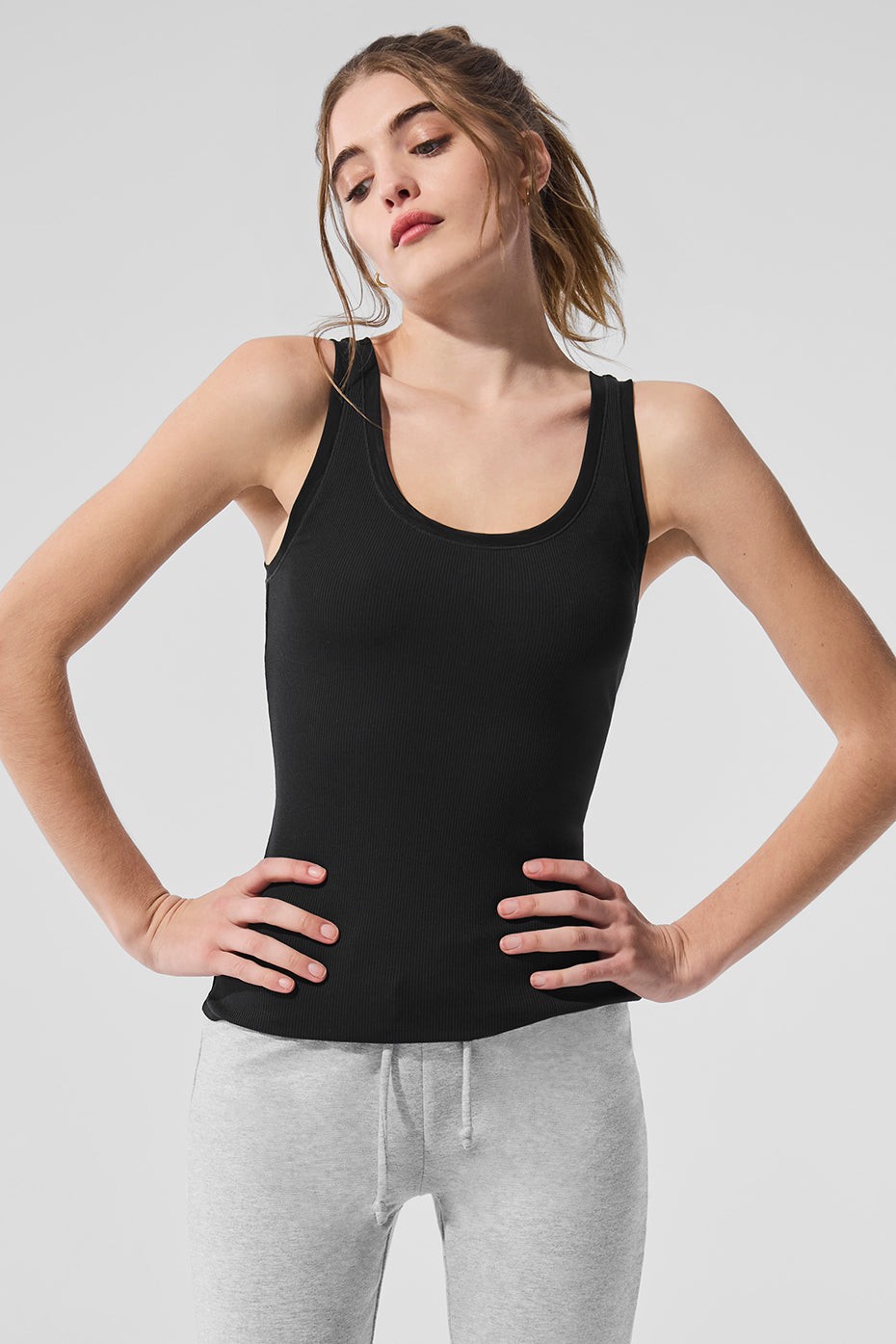 Close-up of ribbed texture and mesh detailing on the tank top
