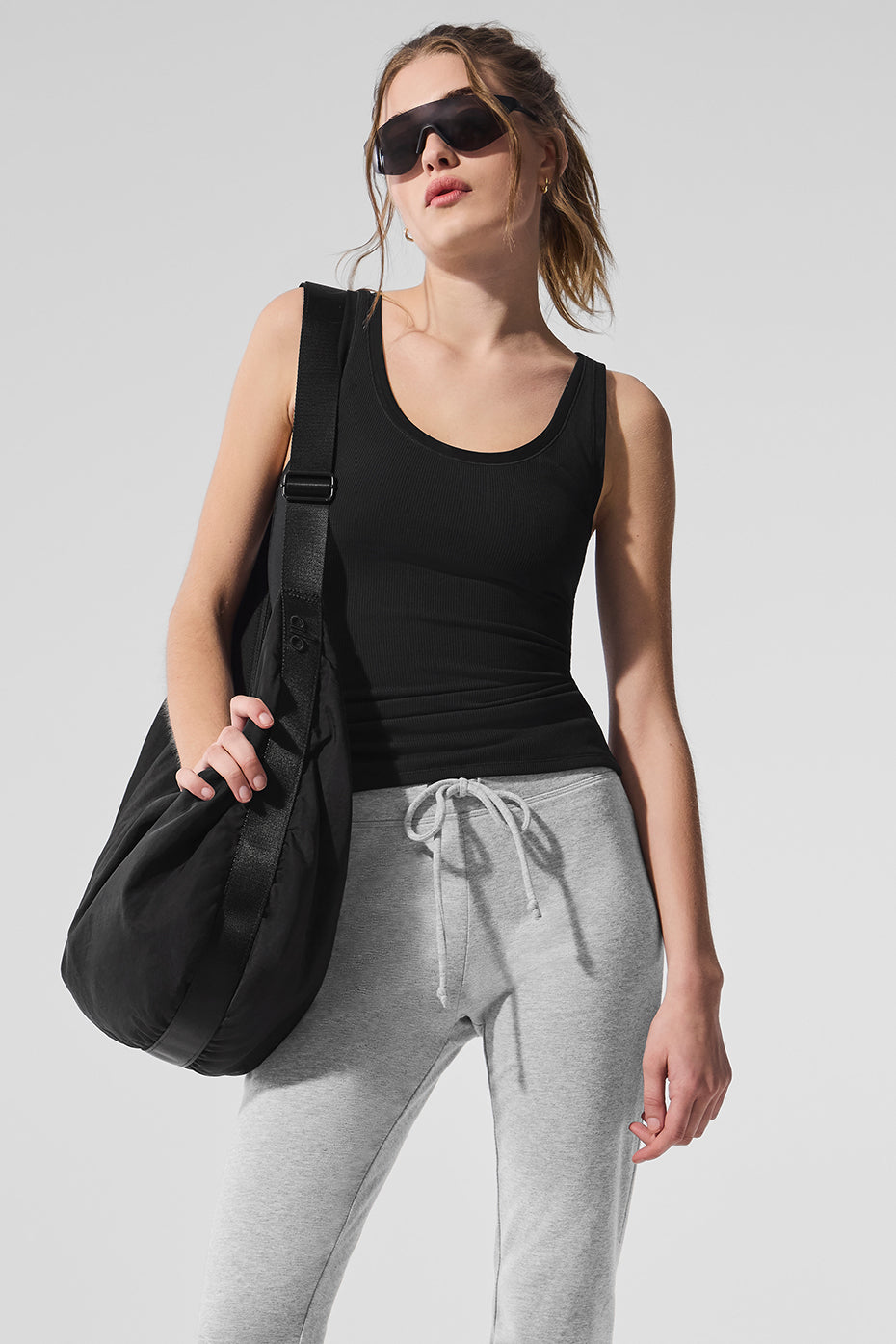 Close-up of ribbed texture and mesh detailing on the tank top