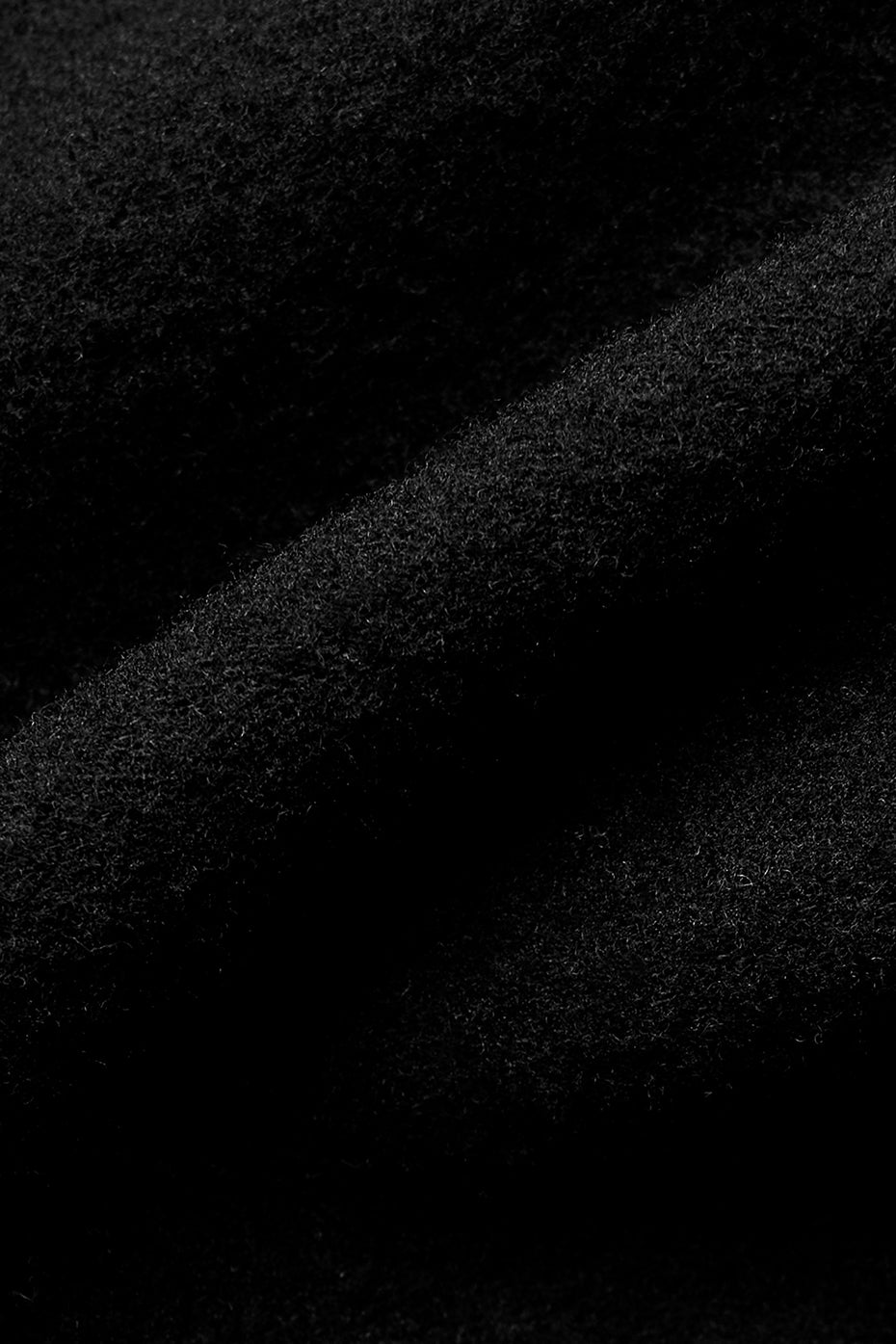 Side angle showing relaxed fit and fleece texture