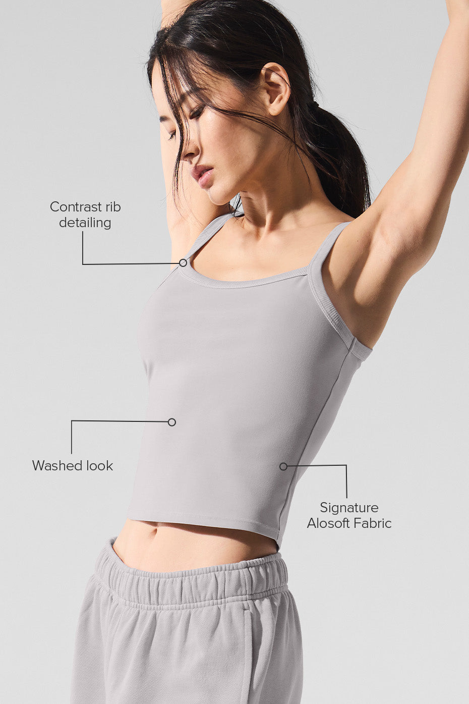 Side view showcasing the contrast rib detailing on the Alo Yoga tank top.