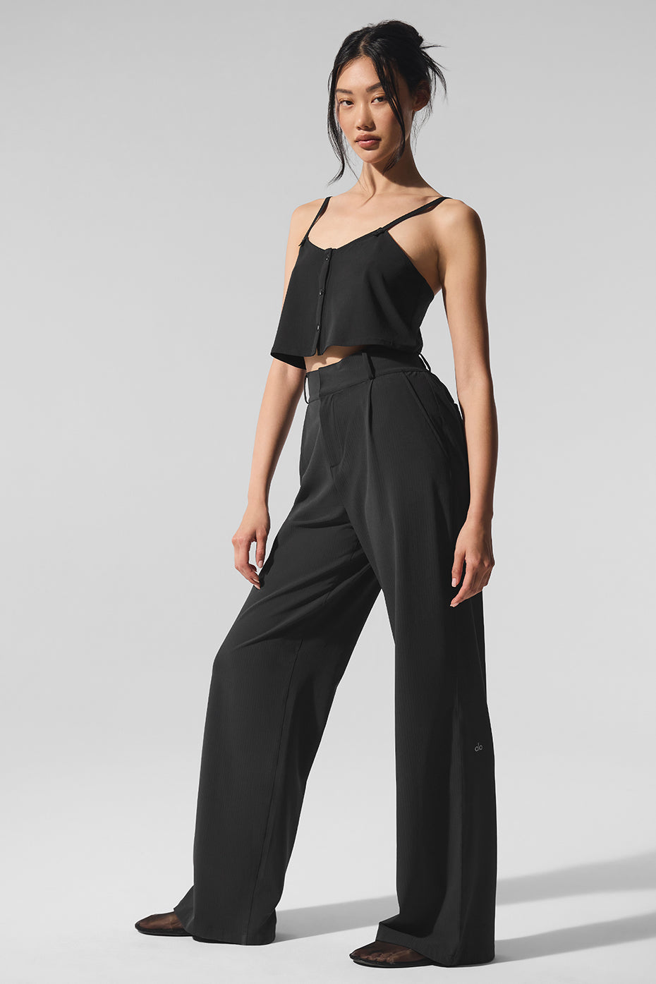 Back angle of breathable summer top showing crinkle texture and relaxed fit