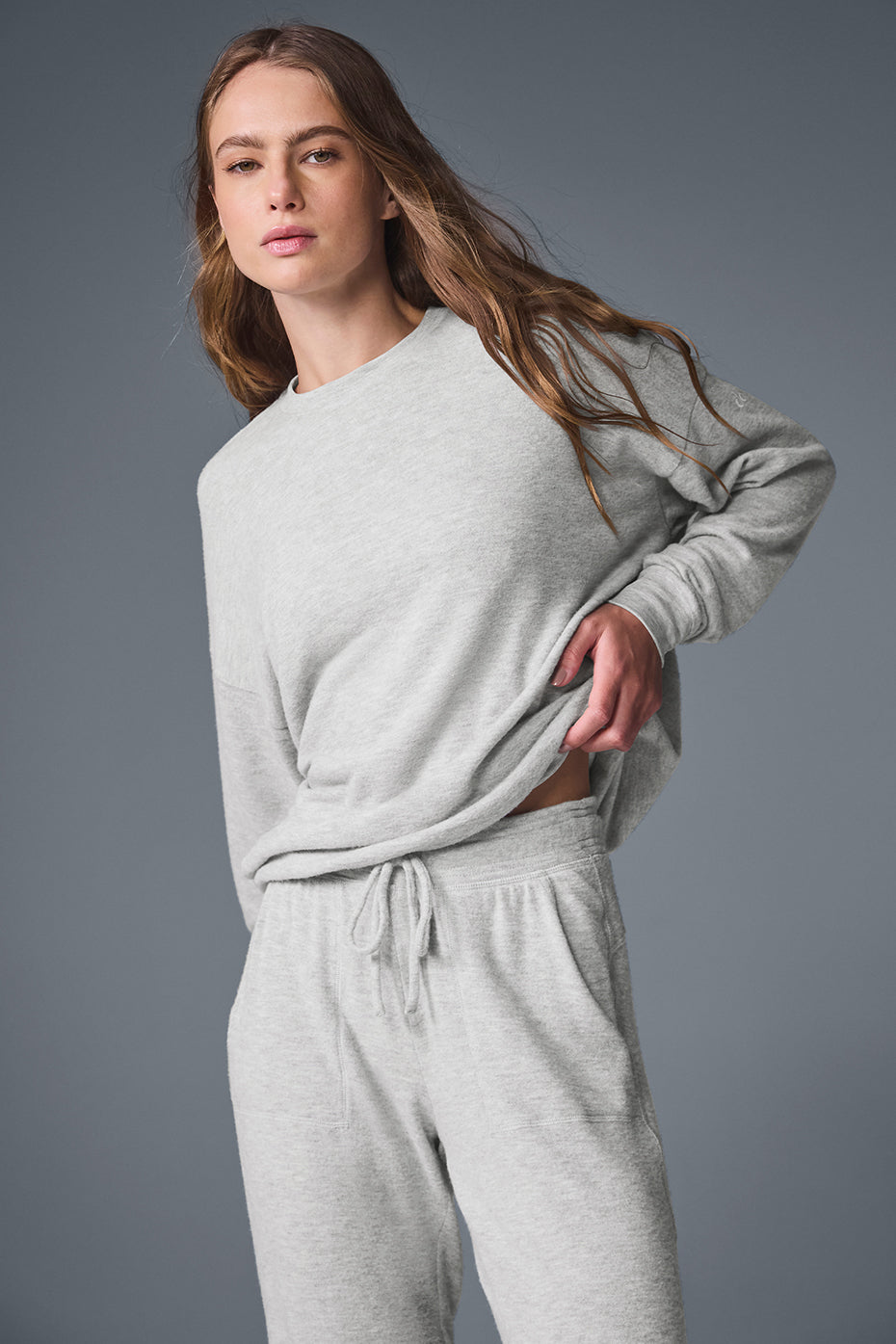 Front view of Soho pullover in athletic heather grey highlighting soft fabric and relaxed fit