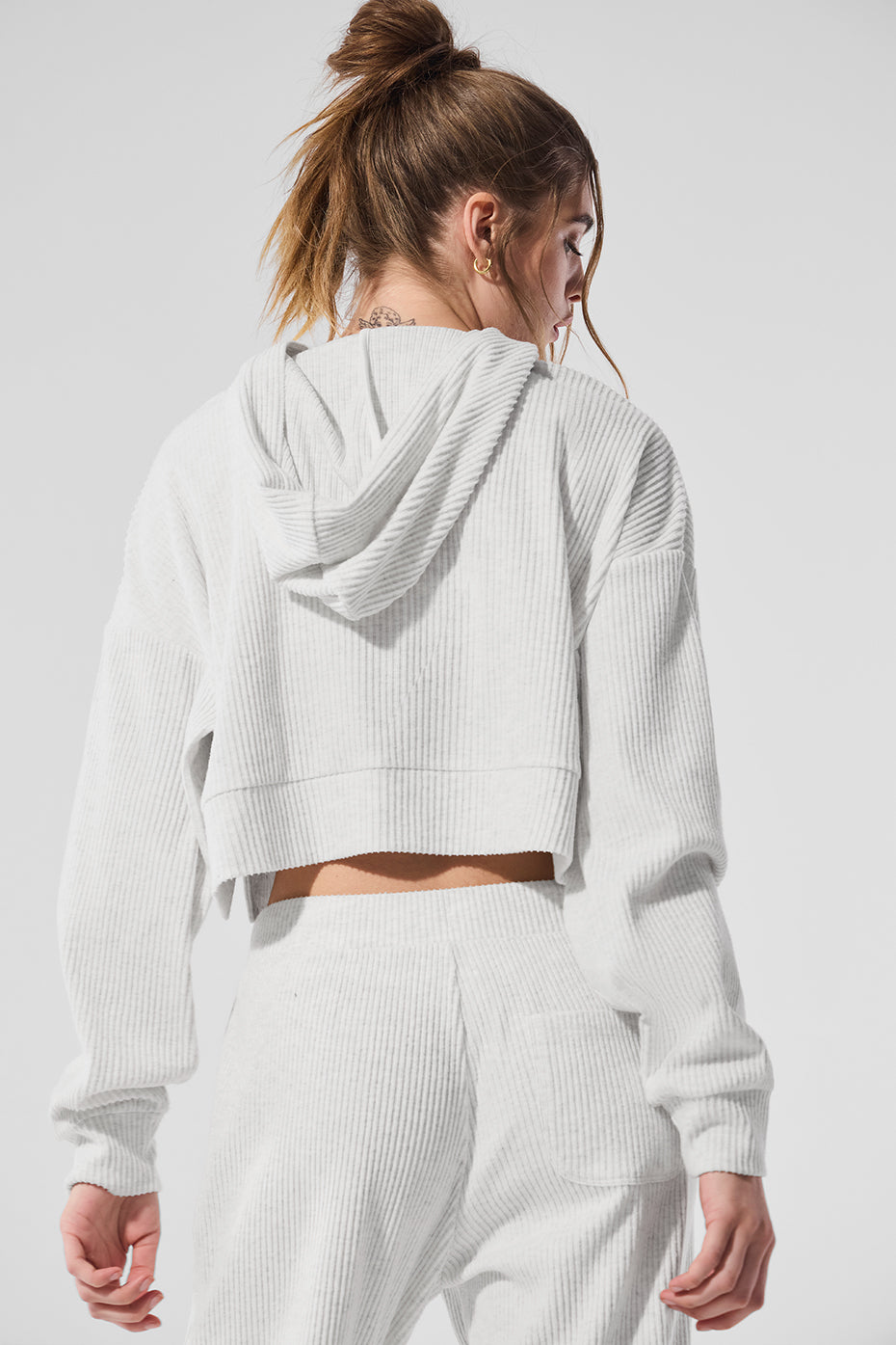 Casual outfit featuring the Muse Comfort Hoodie paired with matching sweatpants, perfect for lounging.