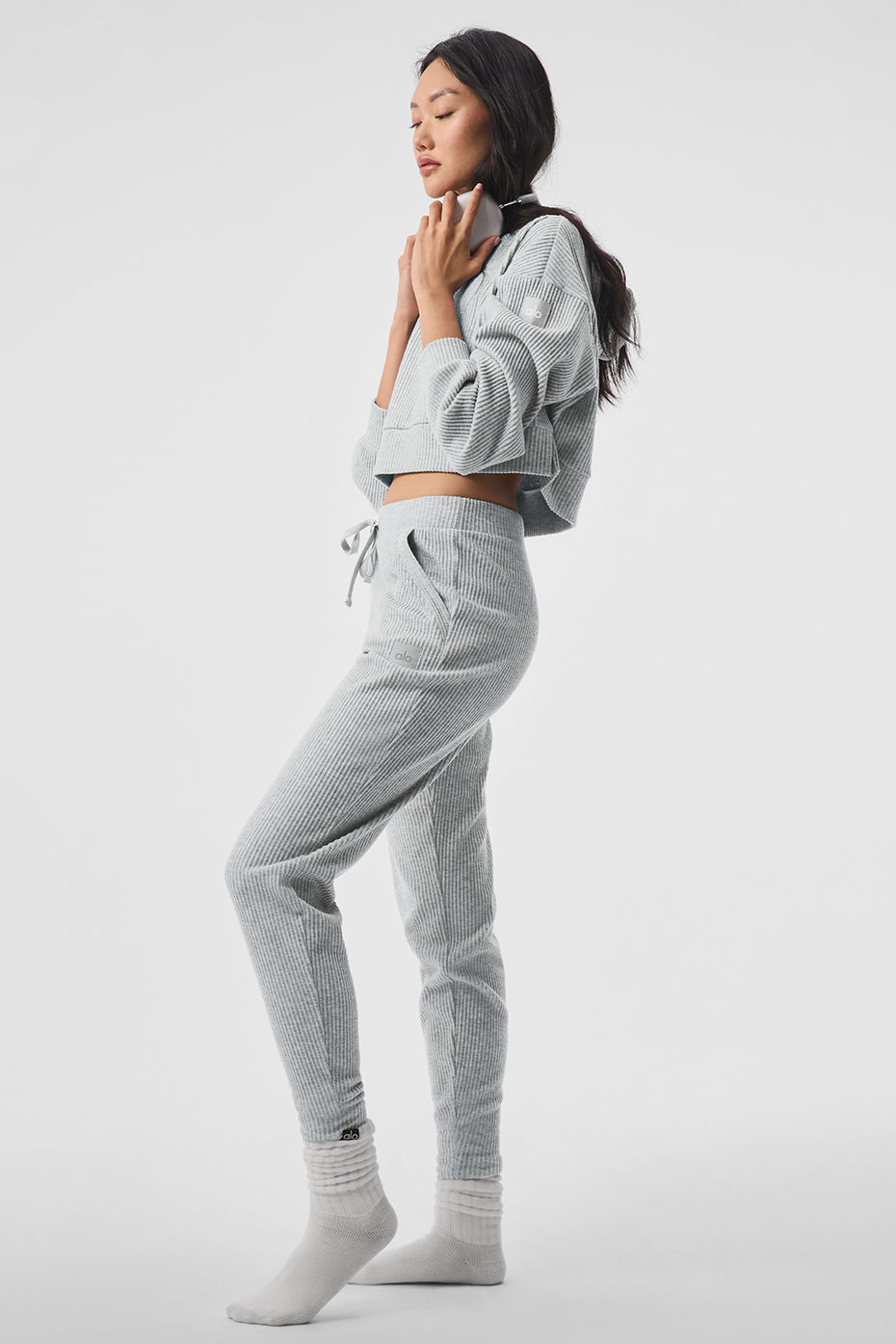 Side view of Muse Comfort Hoodie, highlighting the stylish slits and cropped design.