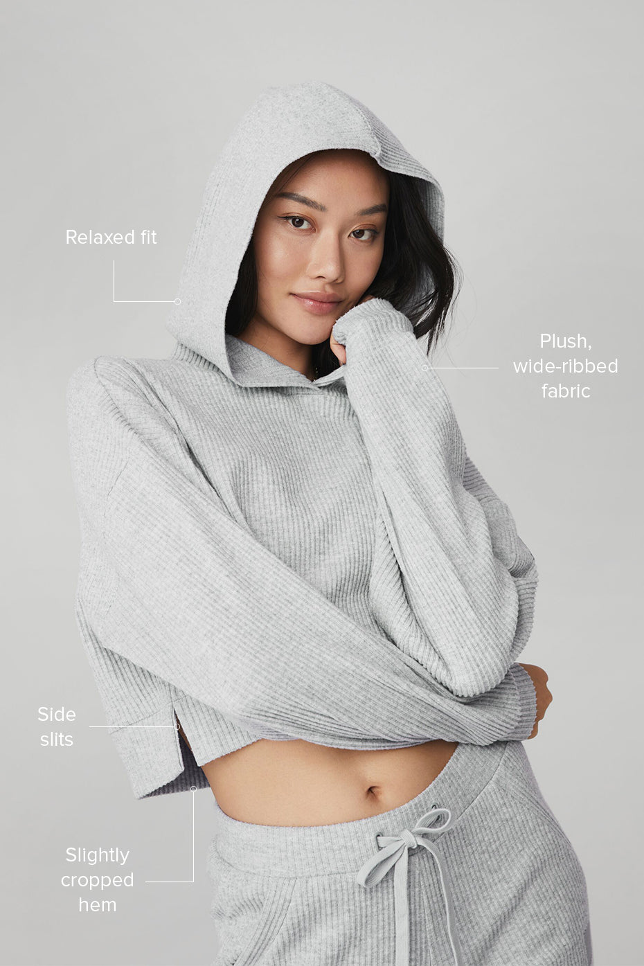Side view of Muse Comfort Hoodie, highlighting the stylish slits and cropped design.