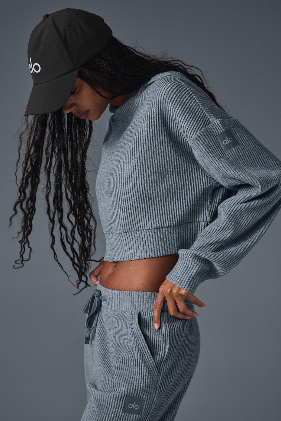 Model pairing the Muse Comfort Hoodie with matching sweatpants for a stylish off-duty look.