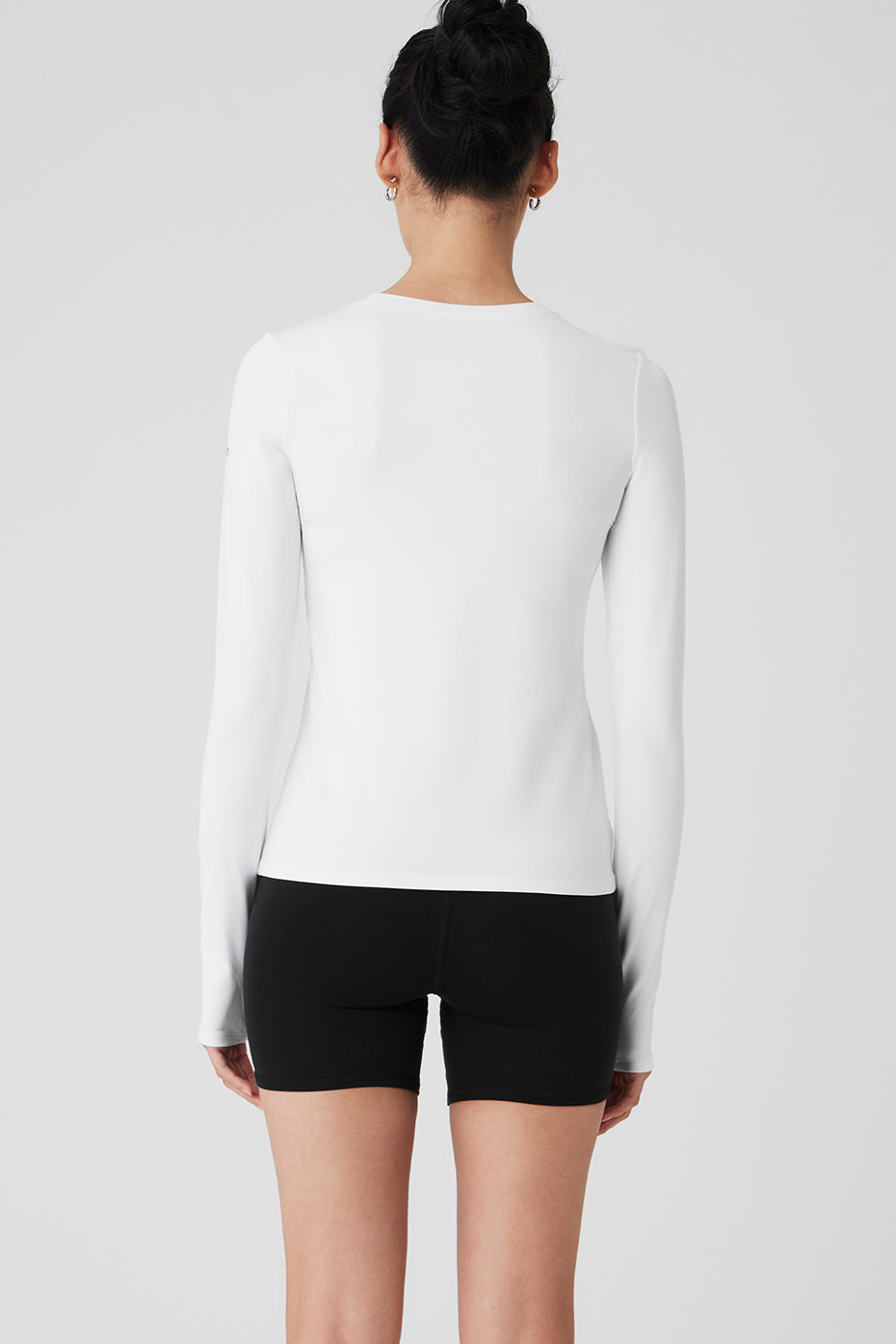 Side view of Alosoft Finesse long sleeve shirt, showcasing its relaxed fit.