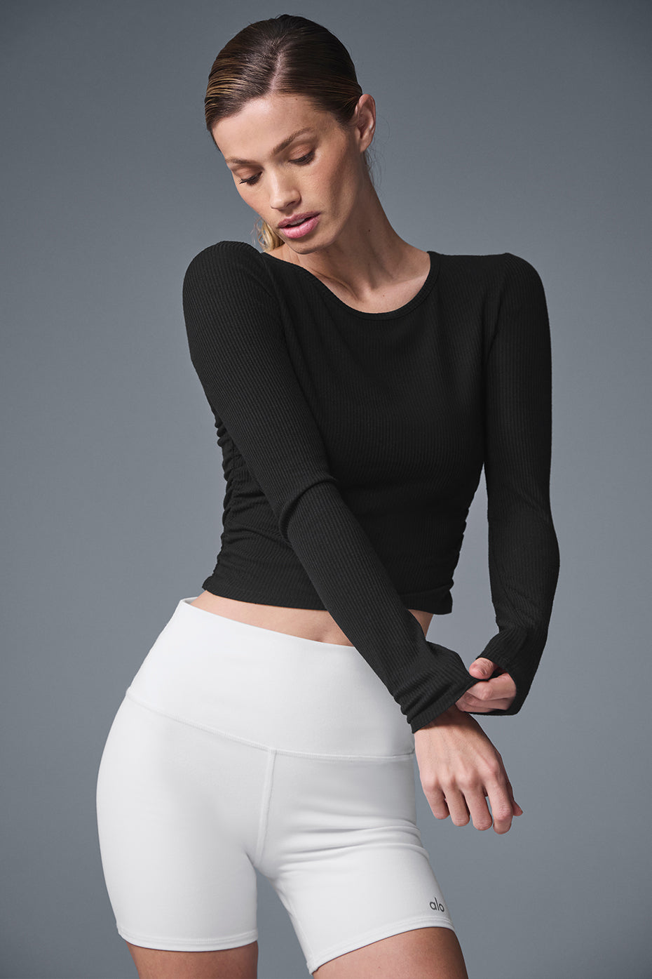 Front view of the black long sleeve shirt, showcasing its silky texture.