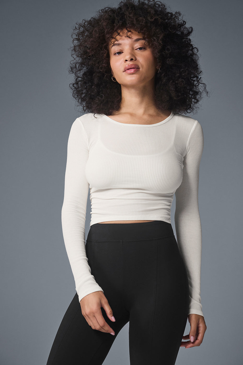 Close-up of the ruched sides on the womens long sleeve top