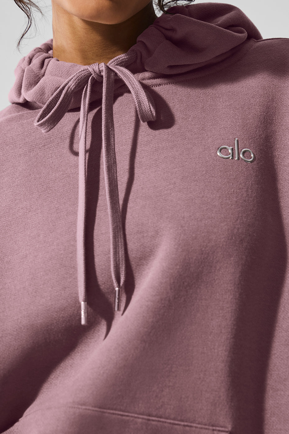 Close-up of hoodie fabric texture showing fleecy interior and smooth exterior