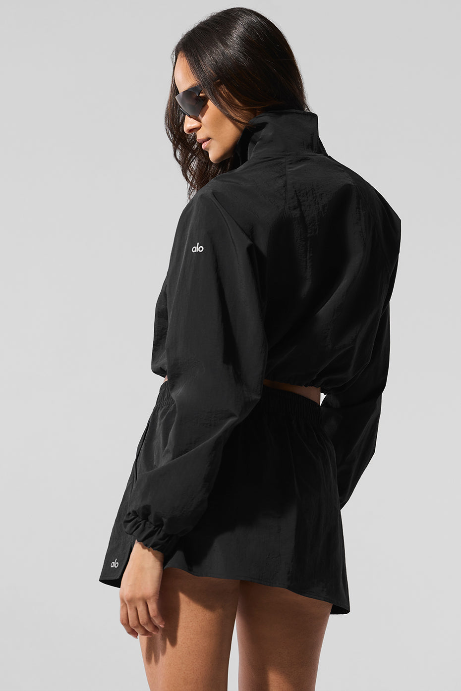Alo alumni pullover styled with high-waisted leggings