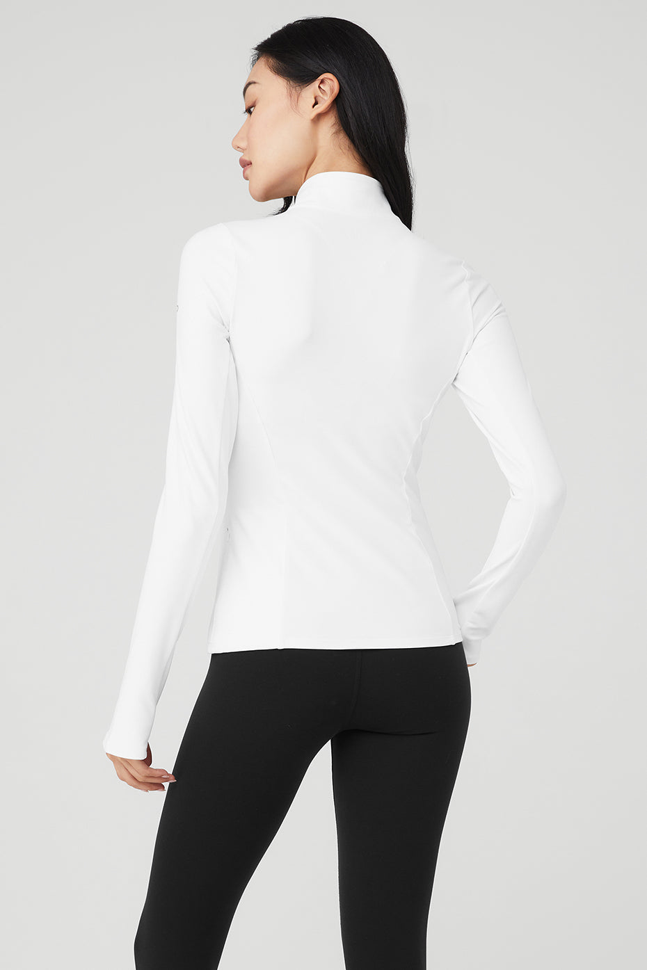 Lifestyle shot of pullover worn during morning jog near Lake Tahoe