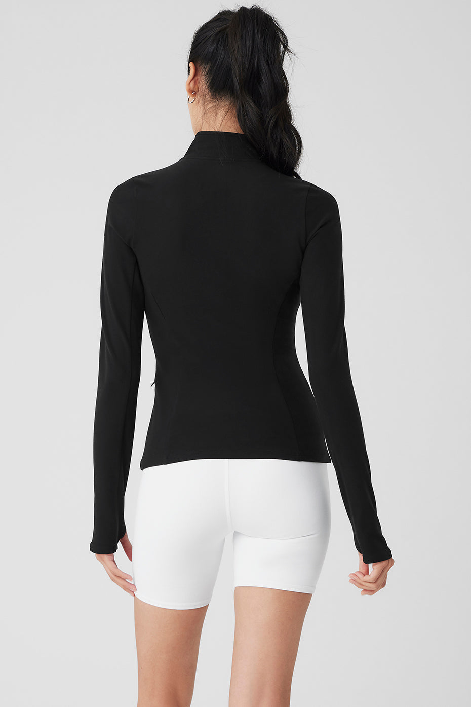 Close-up of breathable Alosoft fabric and zipper detail on pullover